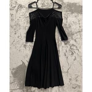 Fit-and-flare dress distinctive off-the-shoulder neckline adorned w/ rhinestones